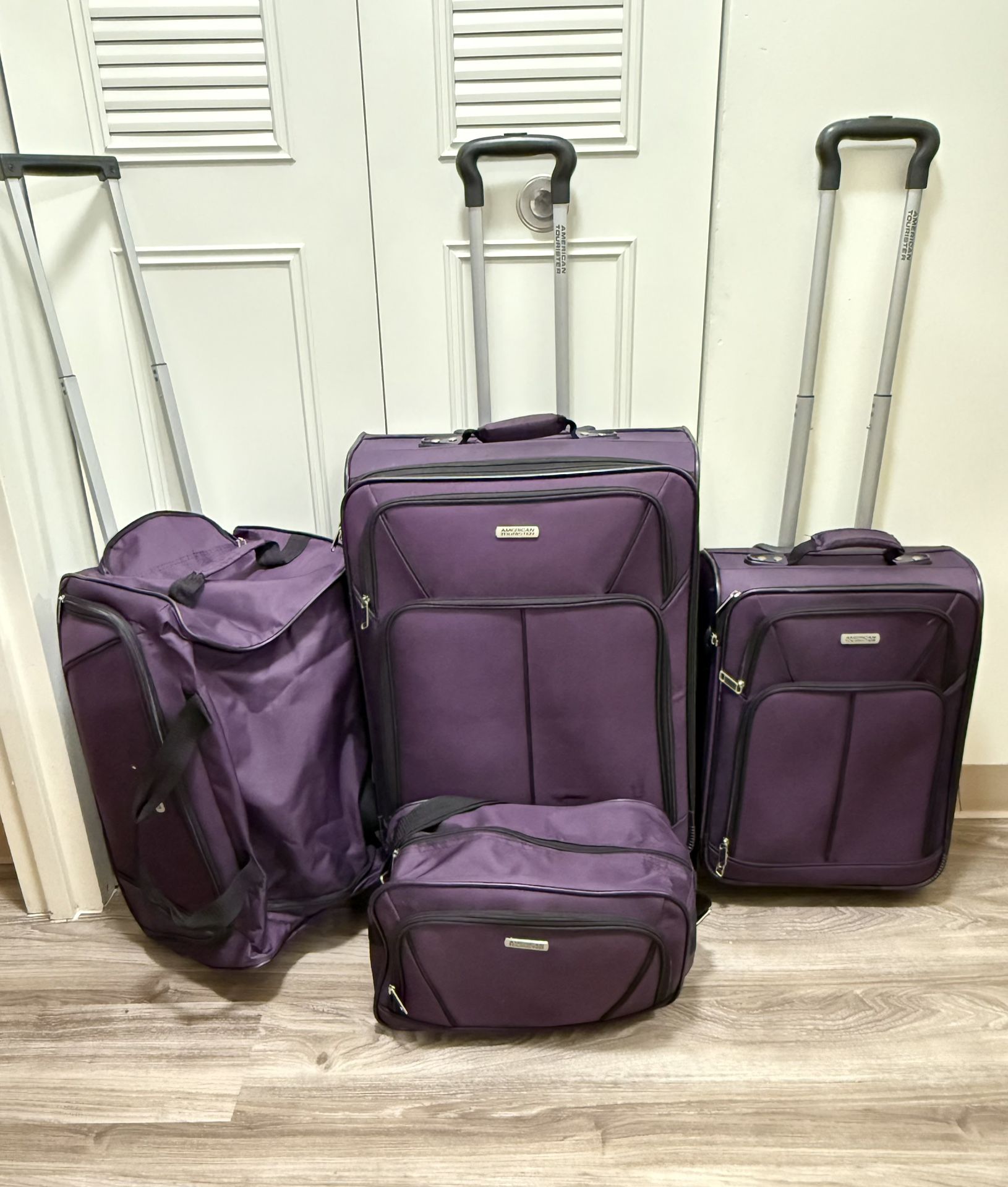American Tourister 4 Piece Softside Luggage Set  (Located in Woonsocket, RI)