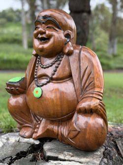 handcrafted wooden buddha statue 