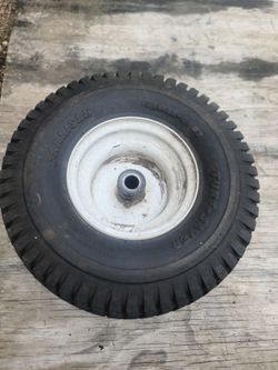 Riding lawnmower front tire and rim 15x6