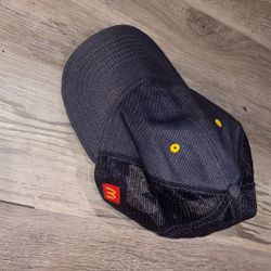 This is a McDonald's employee uniform trucker hat with a mesh back