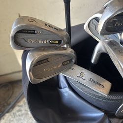 Golf clubs, golf bag and golf balls