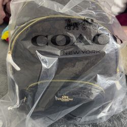 Large coach backpack 