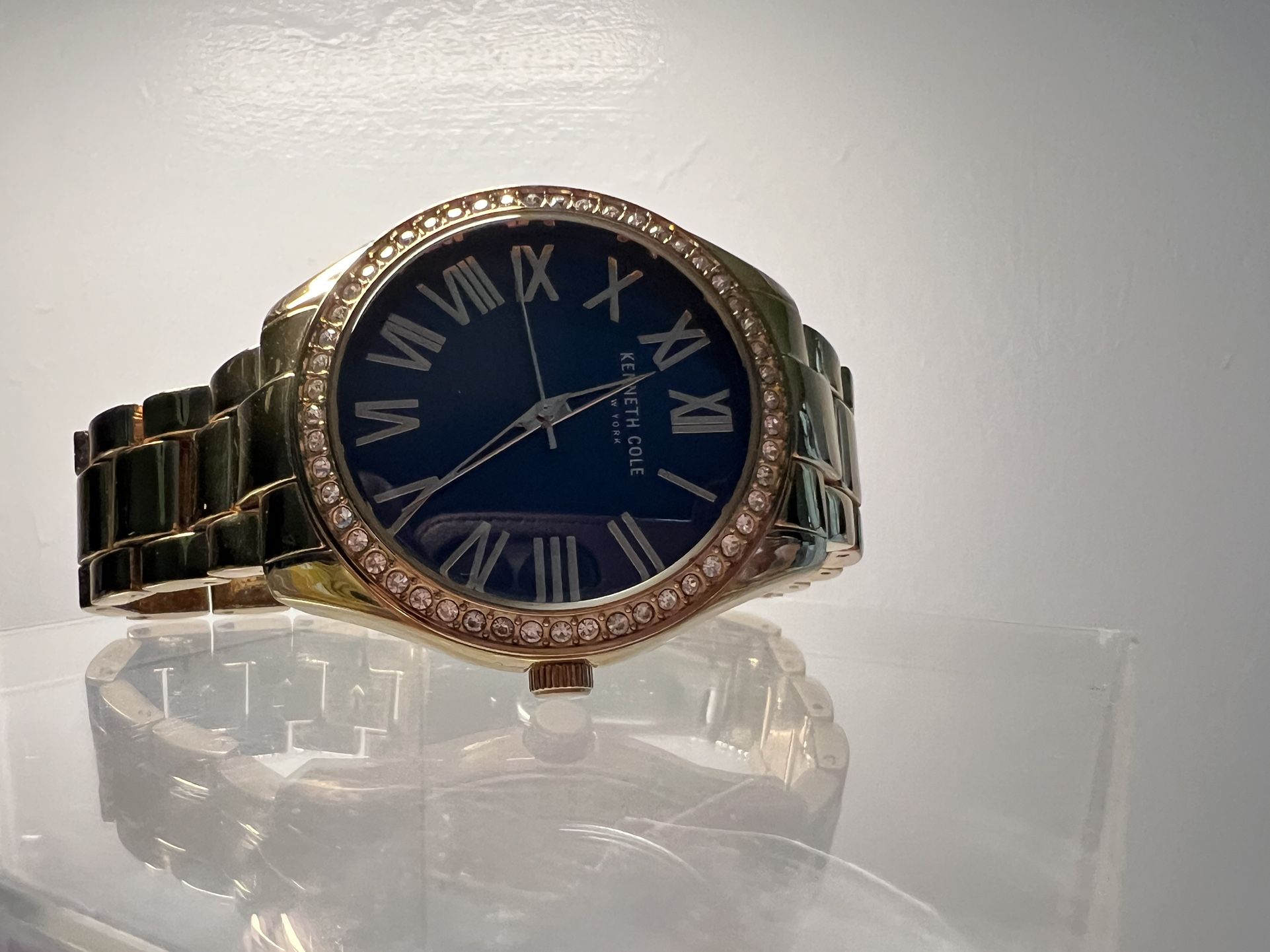 Kenneth Cole gold watch men  The battery works
