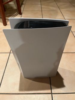 PlayStation 5 disk with controller and 32 inch Samsung Tv