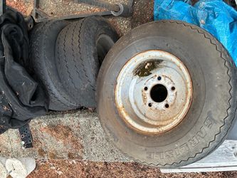 Snow mobile trailer tires and wheels.