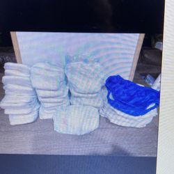 New 24 Diapers And Reusable   Diapers and  4  swim diapers