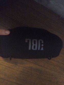 This is a jbl Xtreme 4 it has 100 watts of power it is a great outdoor and indoor speaker it's loud has enough bass to feel it when holding and it's a