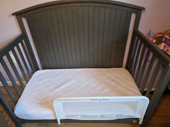 Child Craft convertible crib 4 in 1 crib with matching changing table.