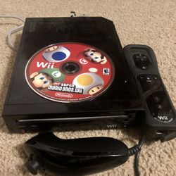 Nintendo Wii And Super Mario Game Package