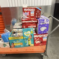 Changing Table With   A Sorted Size Diapers.