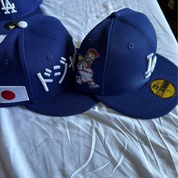 TWO BRAND MEW DODGER HATS BOTH SIZE 7