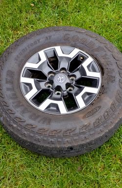 LIKE NEW SPARE WHEEL WITH USED GOODYEAR WRANGLER ALL TERRAIN TIRE 265/70/16 FOR ANY TACOMA TUNDRA SEQUOIA 4RUNNER OR T-100 WITH 6LUGS
