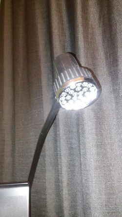 BOLT ON DESK LAMP..just drill hole on ur desk put the lamp screw post through the hole and tighten the nut