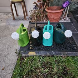 4 PLANT WATERING POTS $4 EACH