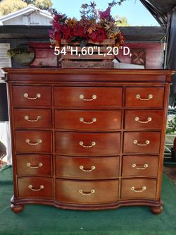 Brown 15 drawer wood dresser