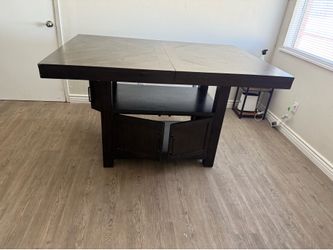Wood kitchen table with storage