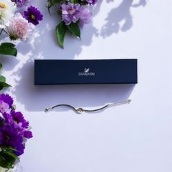 Swarovski Dark Gray Braided Leather Bracelet (contact info removed)