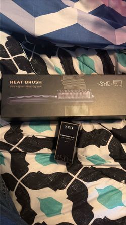 SHE heatbrush with Fahrenheit 450+ hair treatment oil