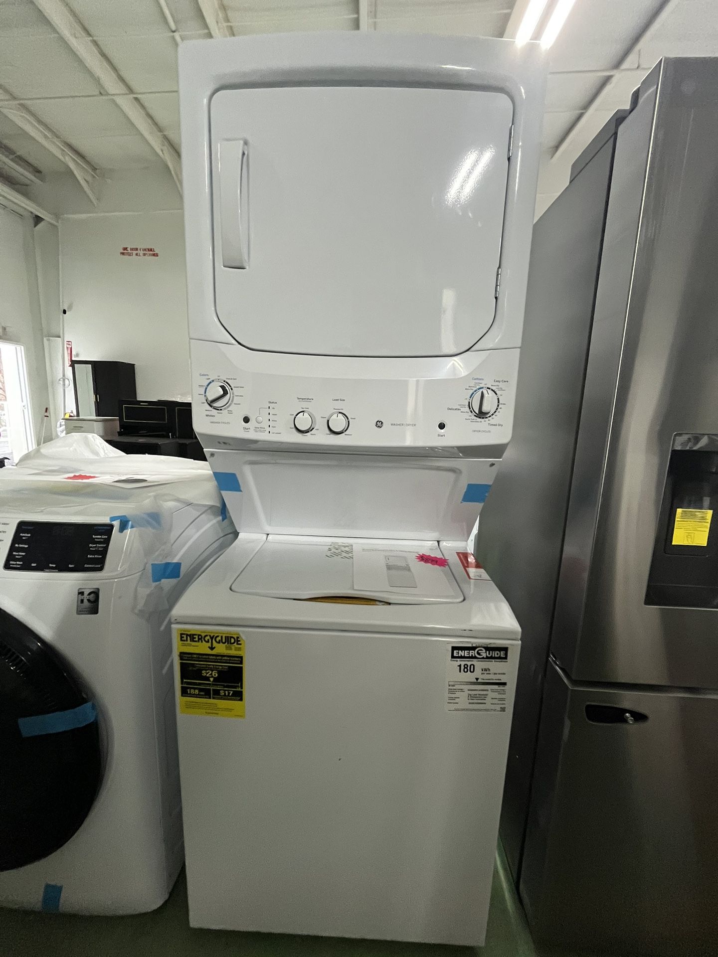 GE GUD27GSSMWW (opened box,minor scratches/dents) 3.8 cu. ft. Washer 5.9 cu. ft. Gas Dryer Combo in White retail $1649. Our price $899
