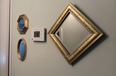 A Set of 3 elegant gold framed Mirrors