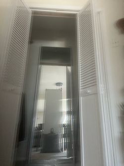 Mirror sliding closet door