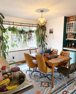Set Of 4 Vintage Leather Rolling Dining Chairs With Button Tufting