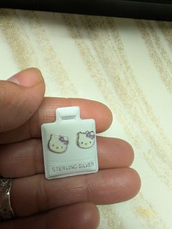 Silver 9.25 hello kitty earrings