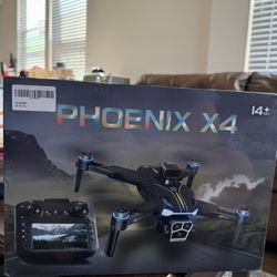 DRONE PHOENIX X4 Camara-Built In Screen Remote. GPS Return to Sea- Sealed Box