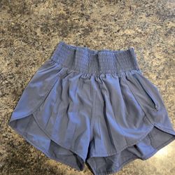 purple shorts with built in liner and pockets