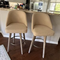 2 Cream colored bar stools