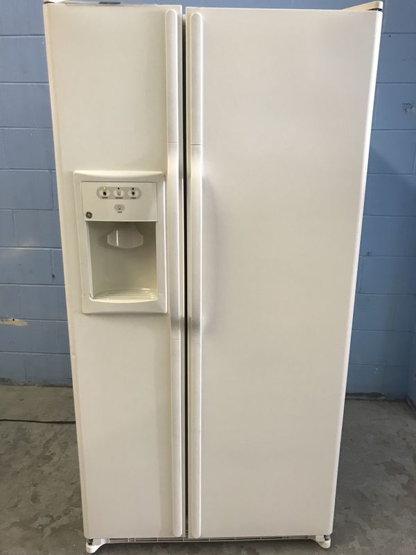 GE Bisque 33" Wide Side By Side Refrigerator for Sale in Cocoa, FL