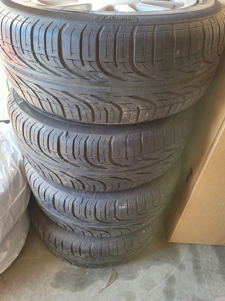 Priced to sell Summer high performance Pirelli tires and rims for Sale