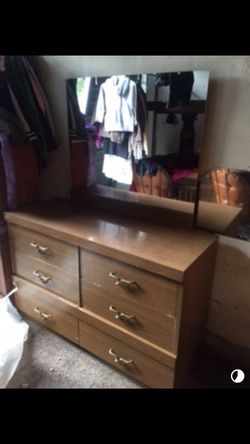 Dresser with attached mirror