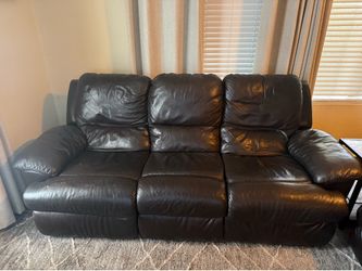 Leather sofa with 2 side recliners. Both recliners operational and work good.  Normal wear.  $100 or best offer