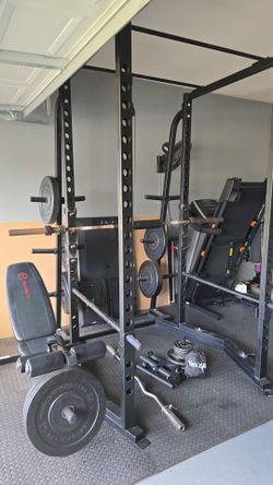 Power rack and weight set! Like New!