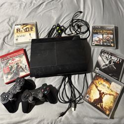 PlayStation 3 W/ Controller,HDMI,Power cord, And Games. 