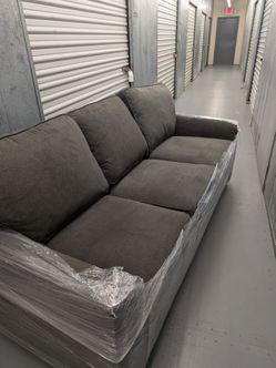 Living Spaces 3 Cushion Sofa
