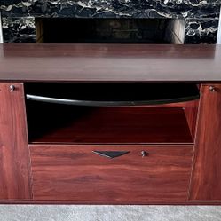Executive Desk,crafted from a reddish-toned wood. Size : 63” W x 28” H x 19” D