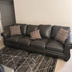 Black Leather sectional Couch