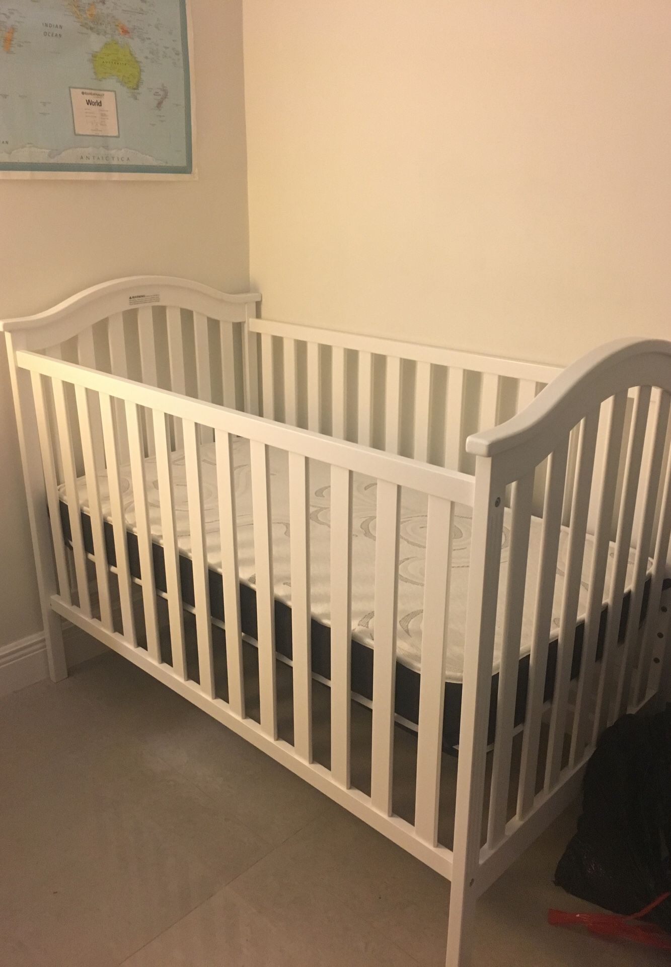 Brand- new white baby crib
