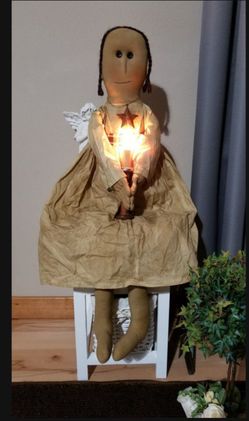 A girl hold elec. candle 37" long new! (One left)