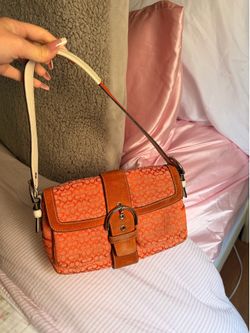 Coach Soho Mini Signature Pocket Flap Handbag in Orange