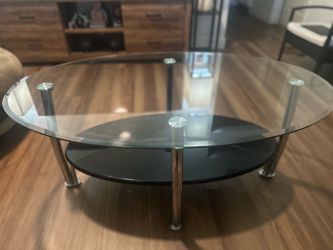 Oval glass coffee table