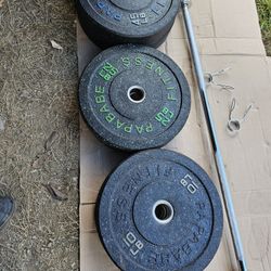 Bumper Plates And Barbell 
