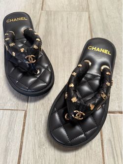 Chanel 23P Black quilted charms padded pool thong logo slide flat sandal