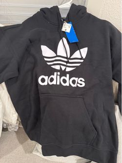 2  New sweatshirts, size M—Vans and Adidas brands.