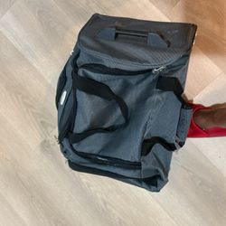 A Carry On Bag With Wheels, In Good Condition