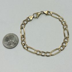 10kt Yellow Gold Figaro Bracelet, 8.5” Long, 7mm, Weights 12.2 Grams 