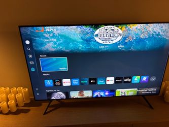 Samsung 55” CU7000 4K UHD Smart TV in excellent condition.