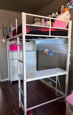 Twin bed with desk and drawers